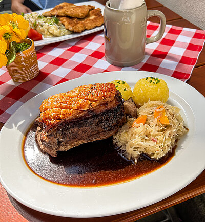 a crunchy Schäuferl with sides a crunchy Schäuferl with sides