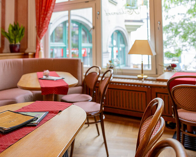 Classic interior with upholstered furniture and round tables. Classic interior with upholstered furniture and round tables.